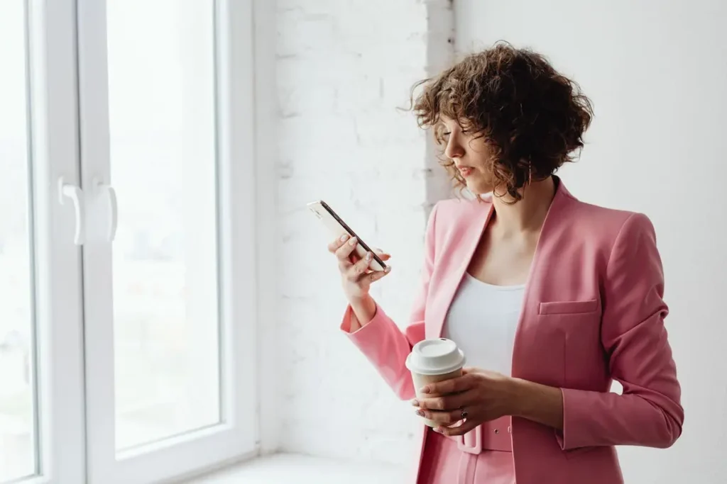 Professional Multitasking with Coffee & Phone