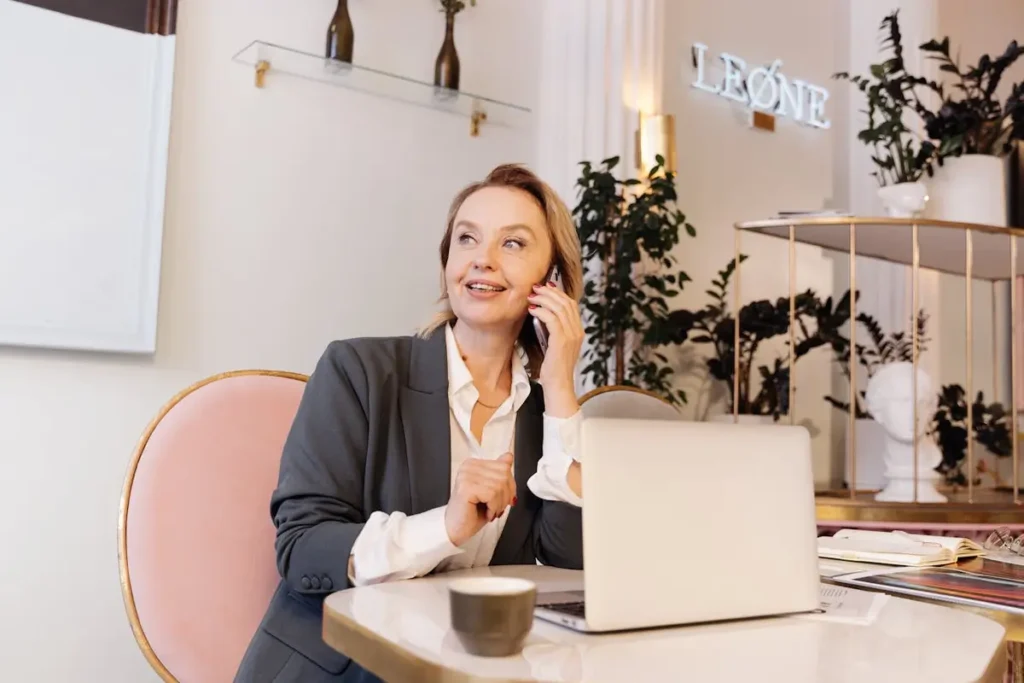 Woman talking on the phone in workplace